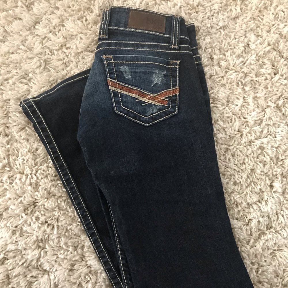 Buckle boot cut jeans.